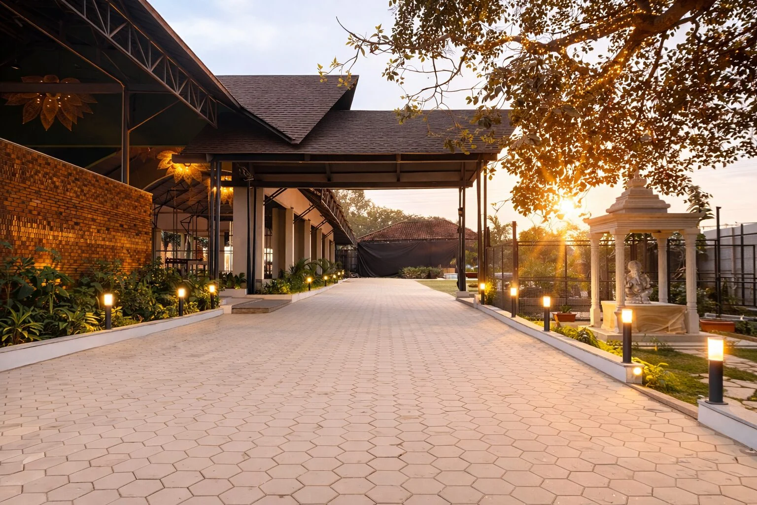 The Samsara arrival drive beside the pavilion in warm evening light