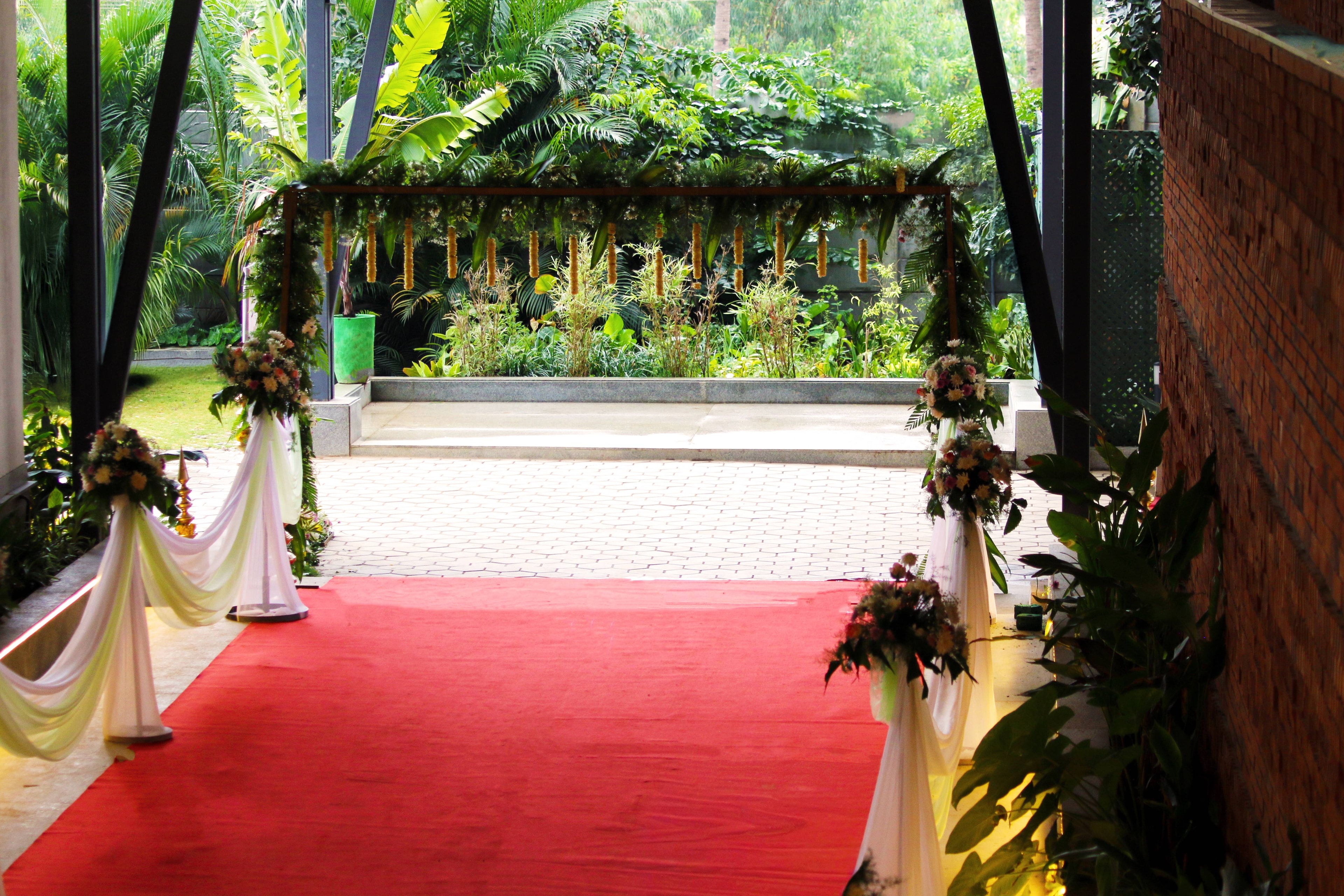 A decorated red-carpet welcome walkway