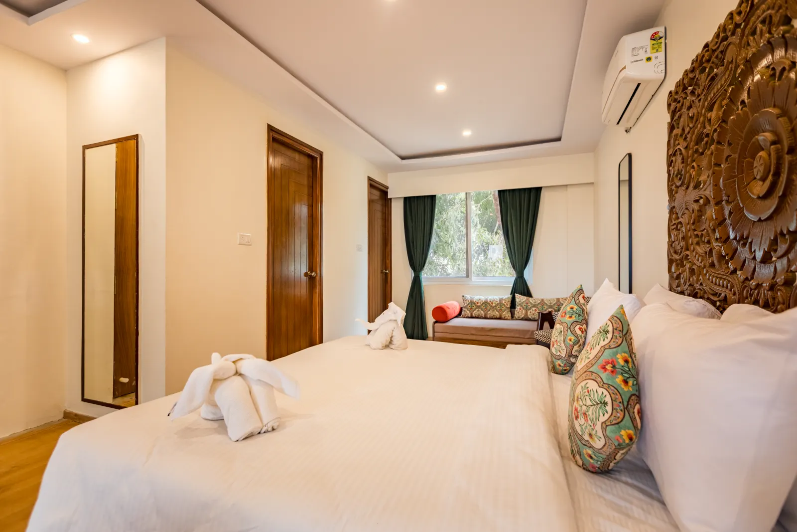 Rahayu Suite with king bed and warm interiors